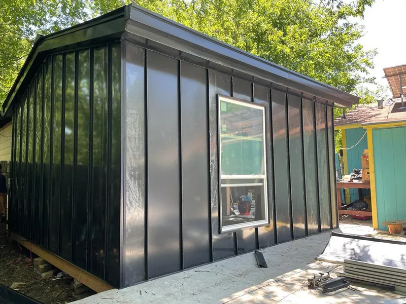 Black standing seam metal wall panels for Roof Inspection in Sheffield